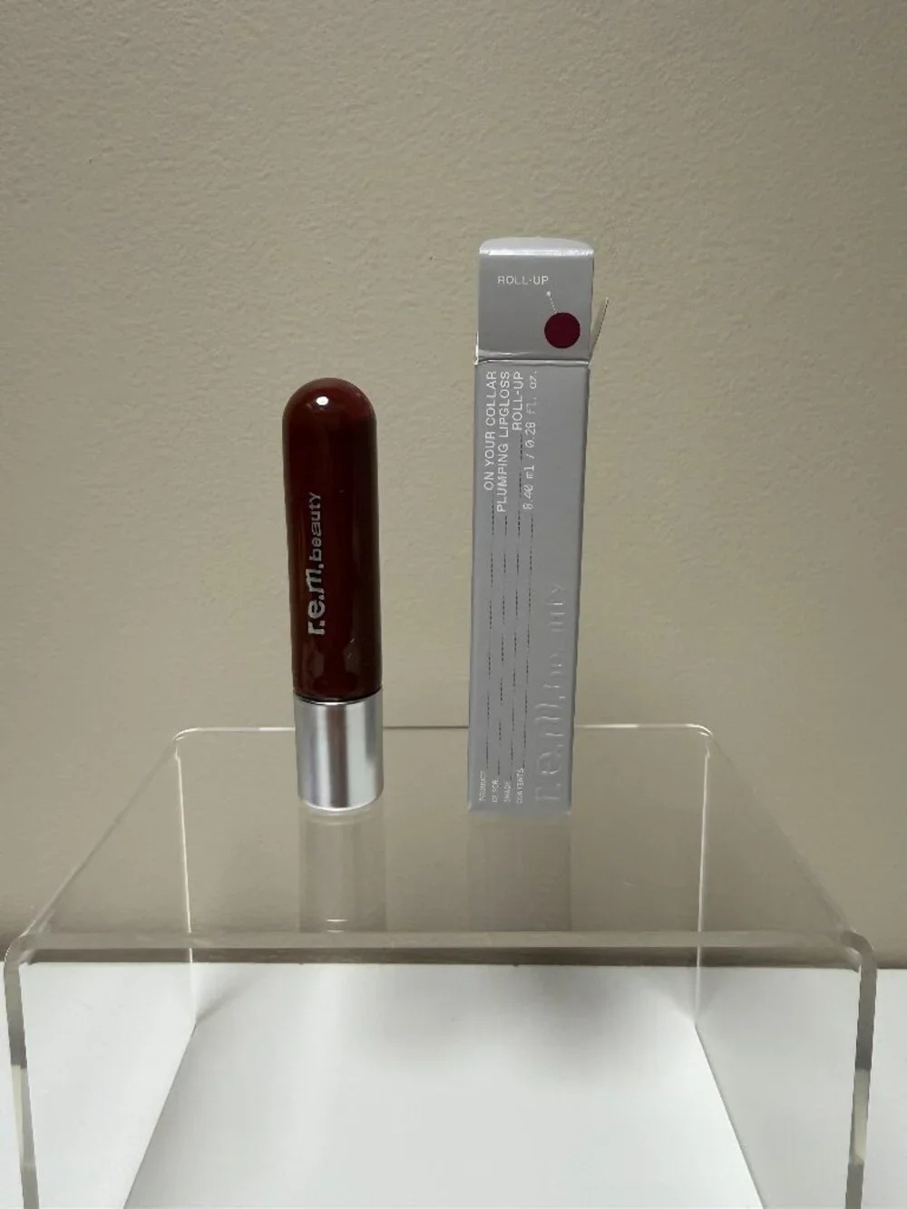 r.e.m. beauty by Ariana Grande On your collar plumping lip gloss Roll Up